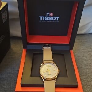 Tissot Gold Watch with Cream Strap
